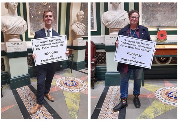 Cllr Fenton-Glynn and Cllr Sarah Courtney at Halifax Town Hall with boards pledging their support for IDOP