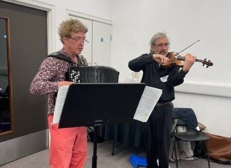 Musicians playing at the Homes for Ukraine event