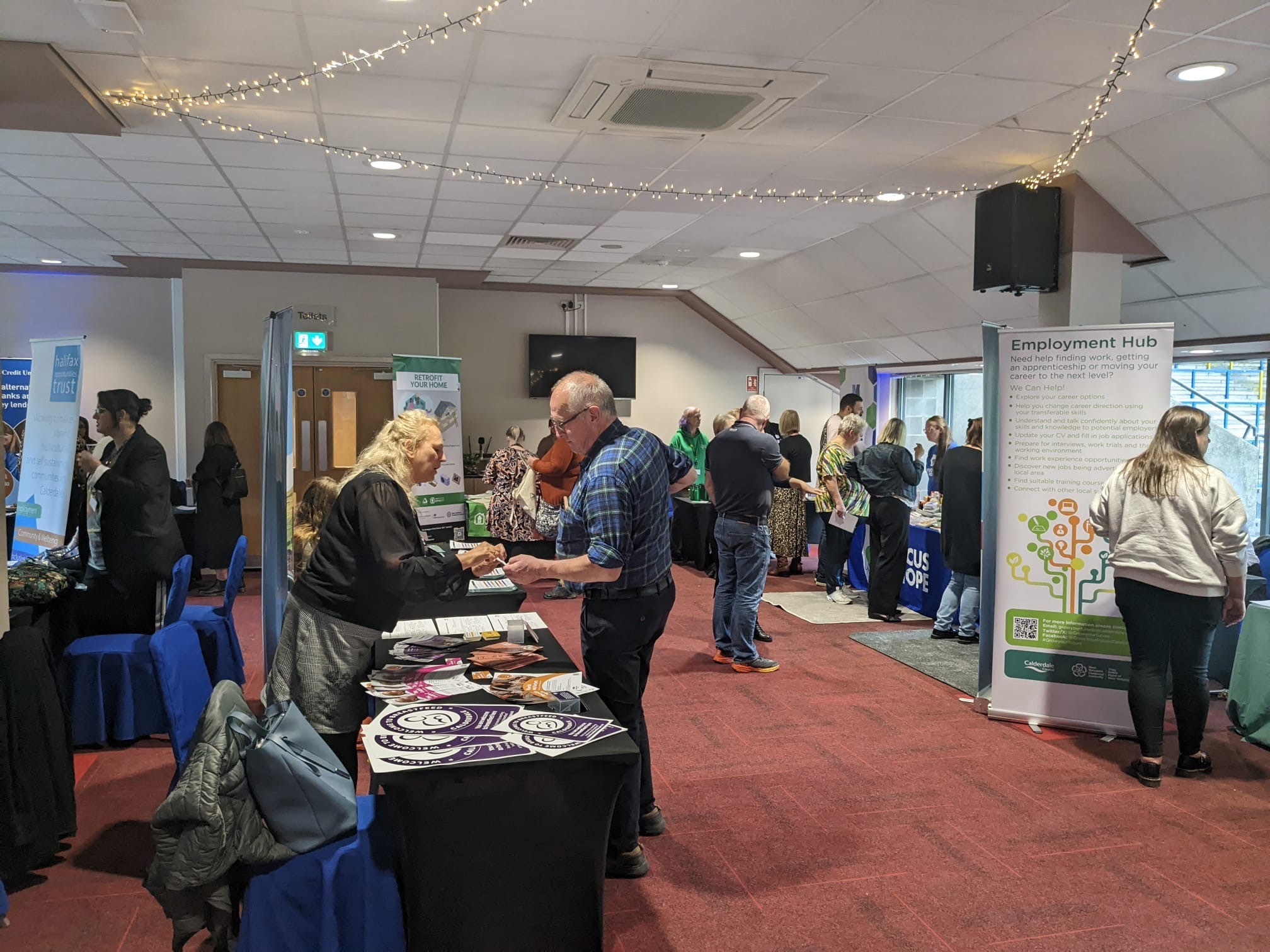 People at the marketplace event at the Shay Stadium