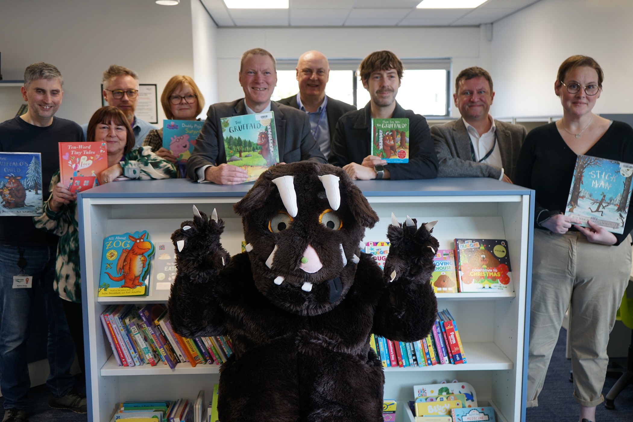 Representatives from Calderdale Council with the Gruffalo in the new Mixenden Library