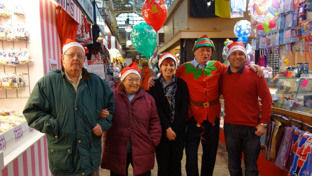 Stallholders and customers at Halifax Borough Market