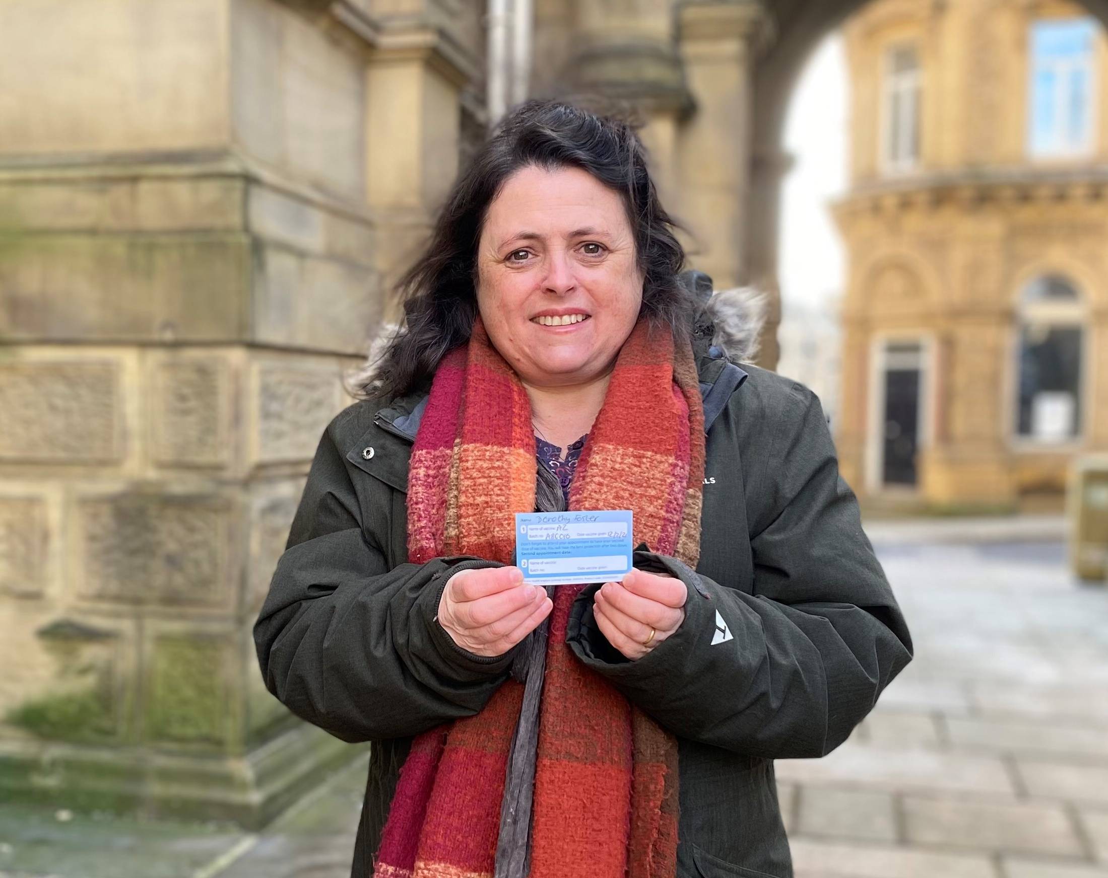 Cllr Dot Foster with her COVID vaccine card