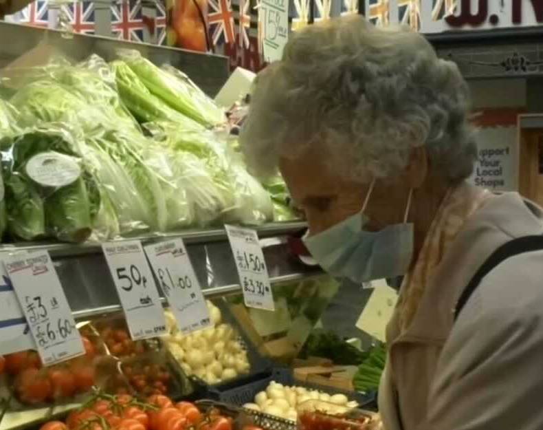 Shopper wearing face covering