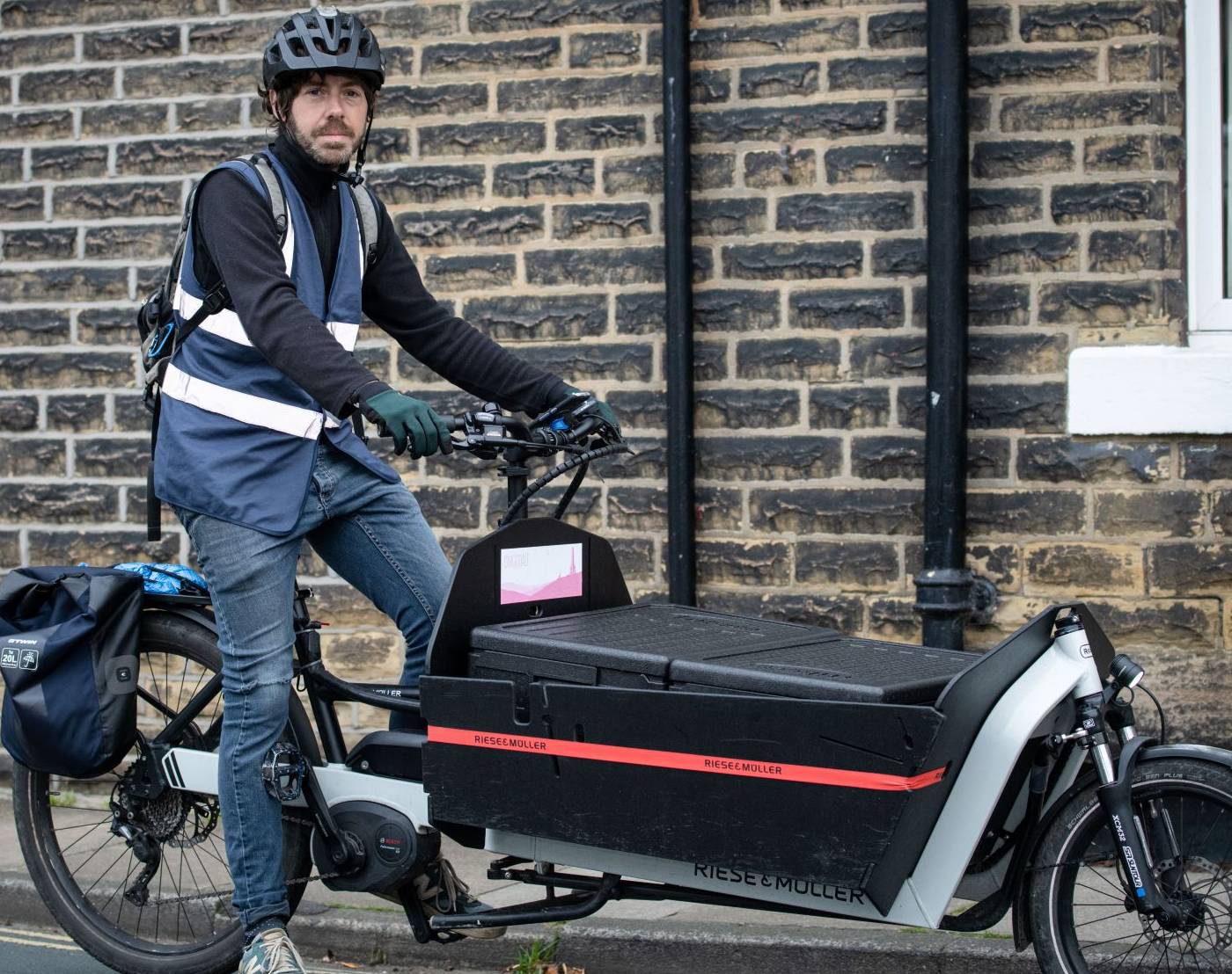 Cllr Scott Patient on a cargo bike