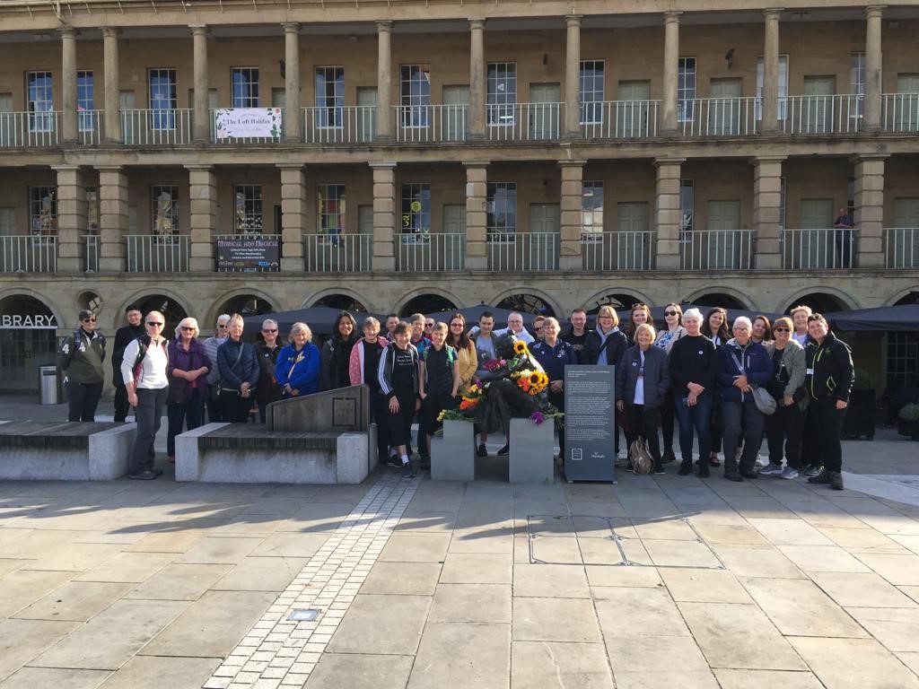 Visitors gathered around the Anne Lister statue at the Piece Hall
