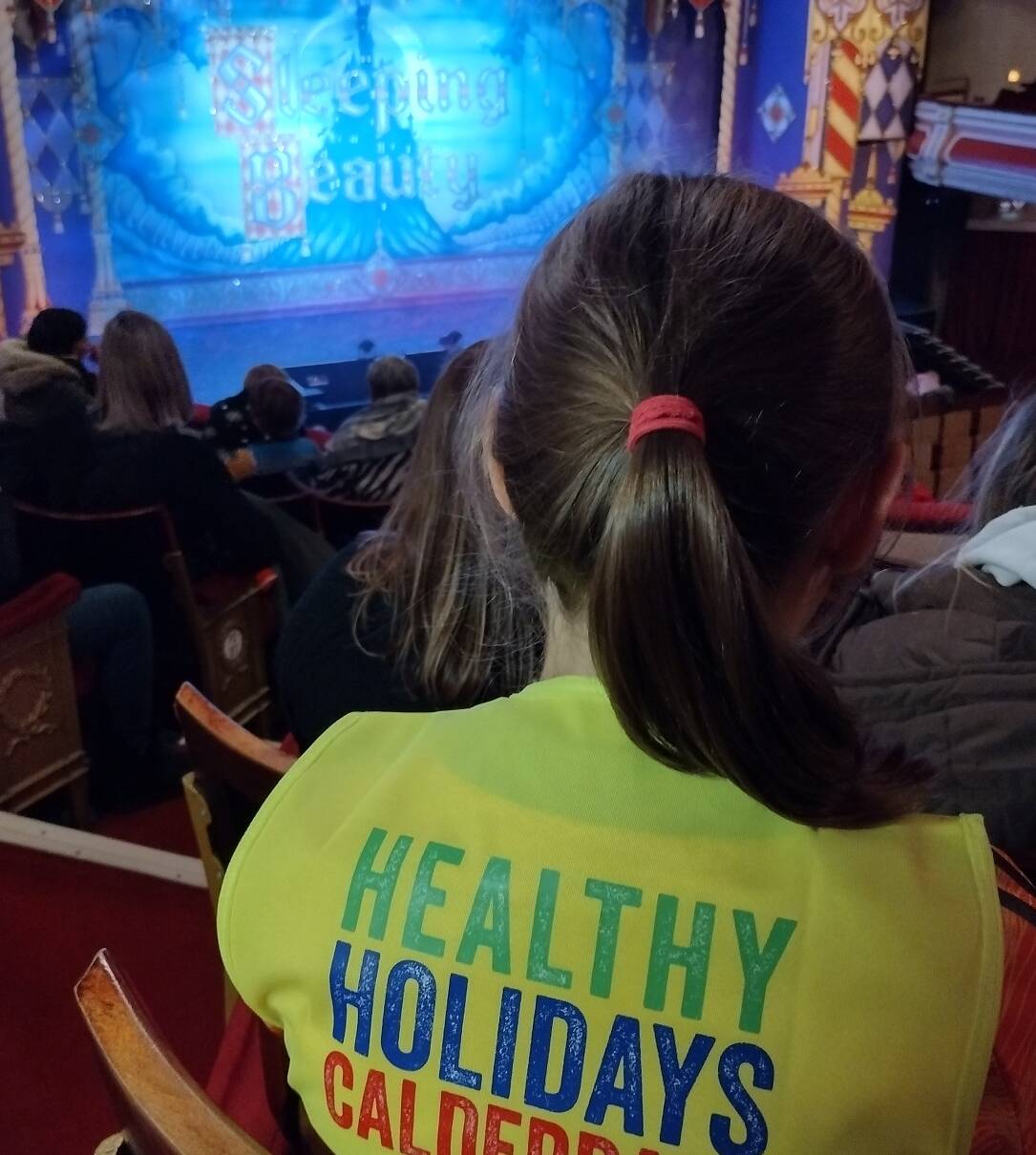 Child watching the pantomime at the Victoria Theatre