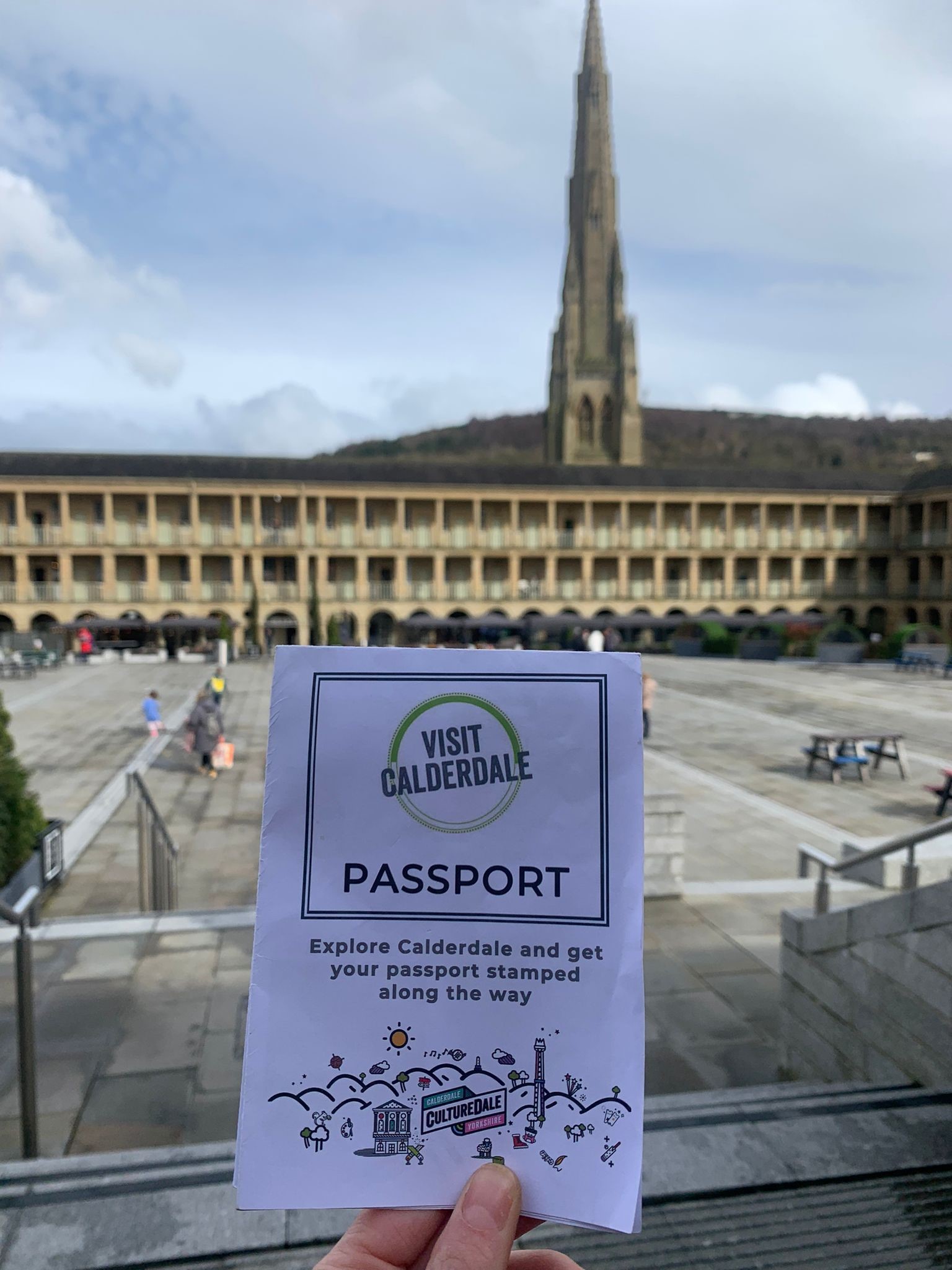 Image of the Calderdale passport booklet in the Piece Hall