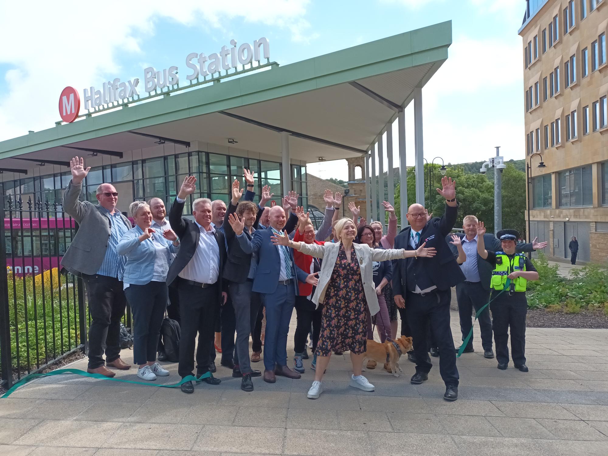 Halifax bus station opening. Gathering of people celebrating with the Mayor of West Yorkshire in centre.