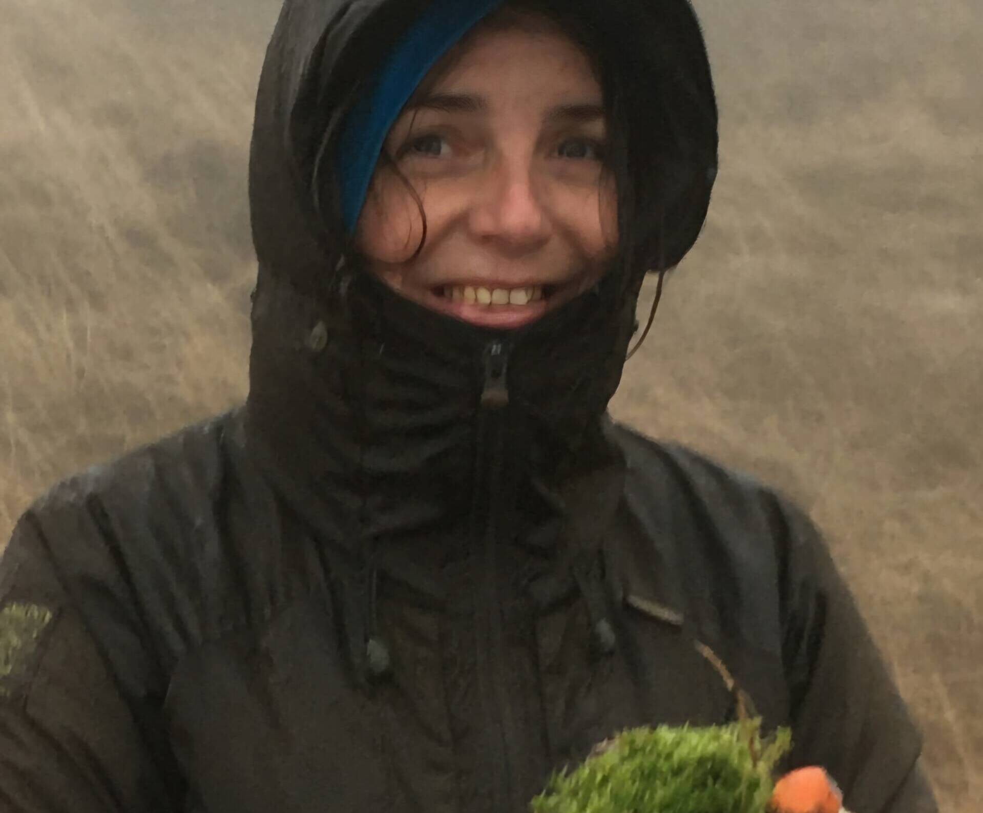 Gill Wrigley pictured in rain with moss.