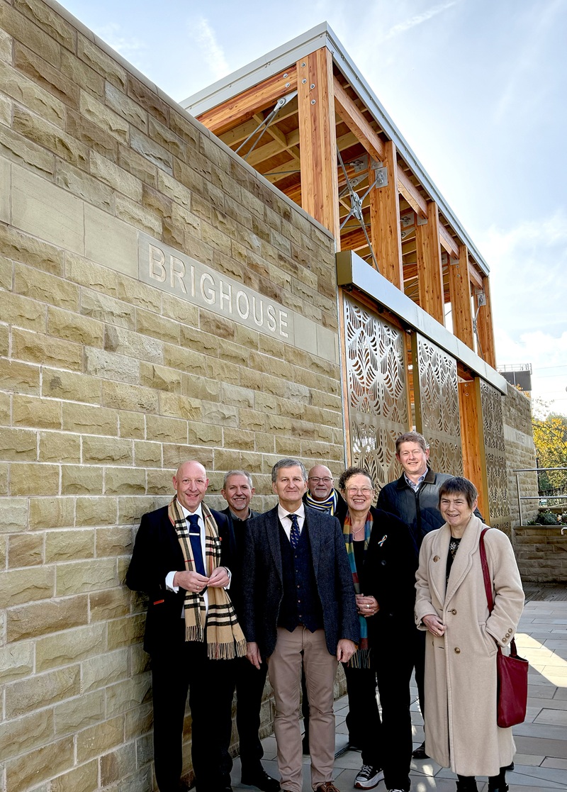 Group of people stood outside the new Brighouse Market