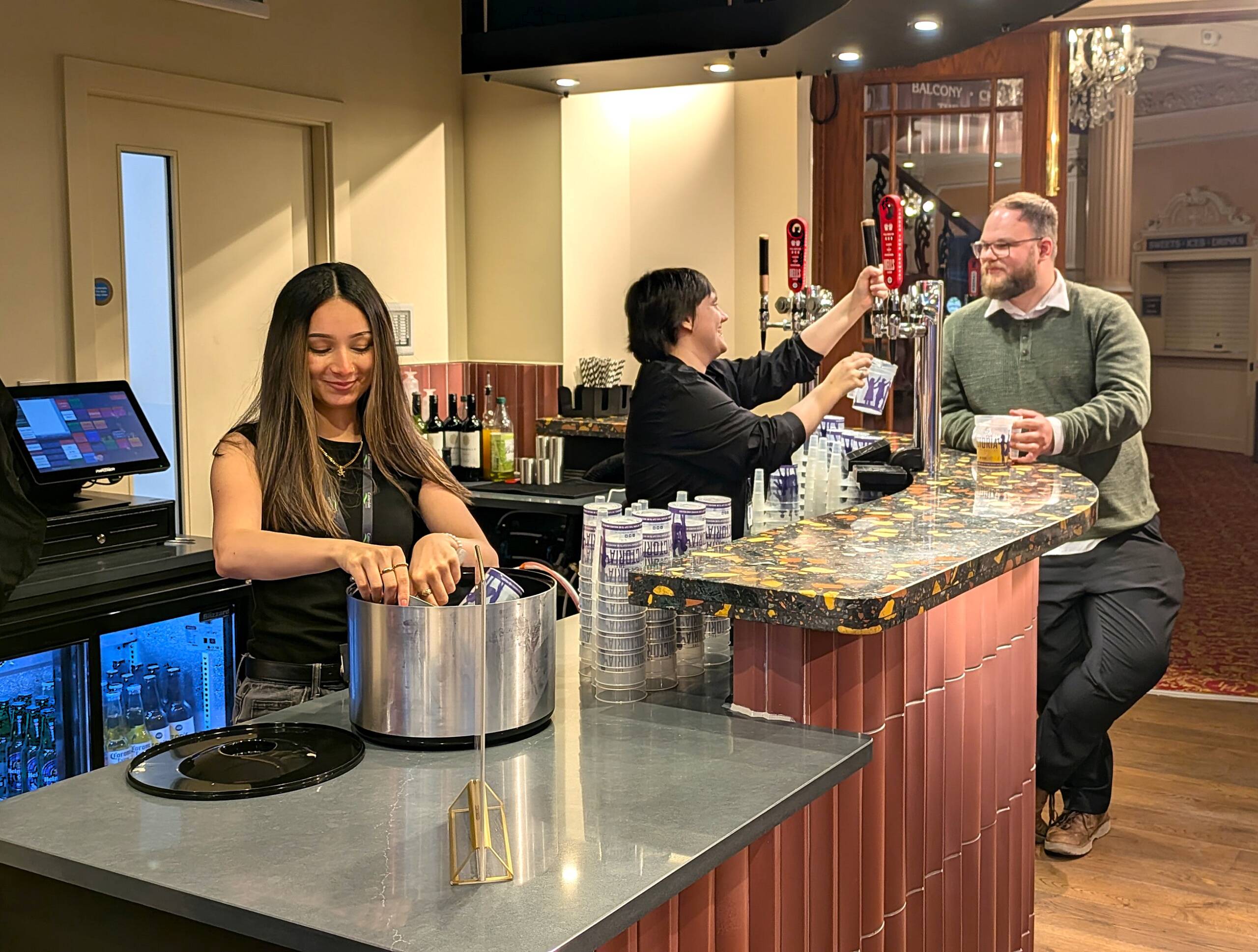 Staff working at the new Victoria Theatre bar