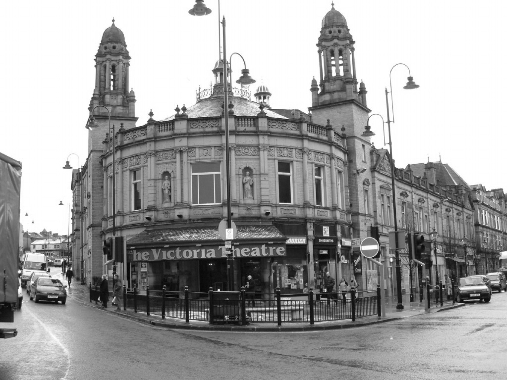 Black and white images showing theatre from outside