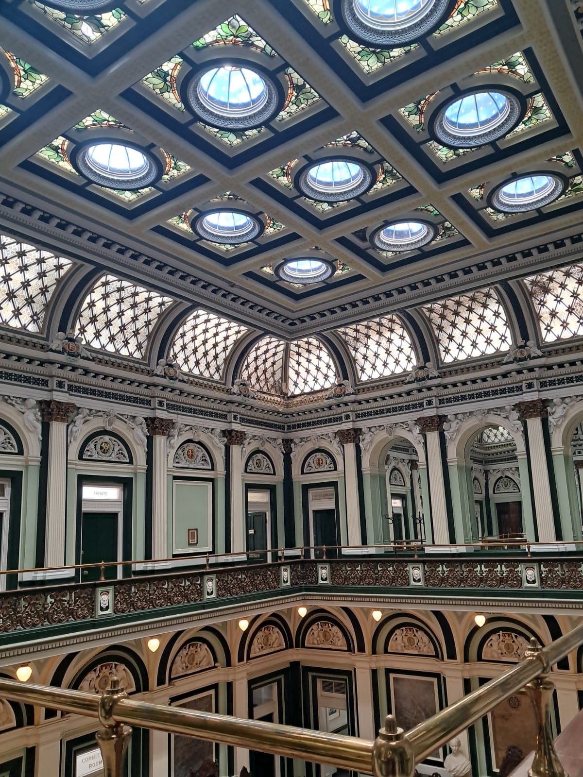 Inside Halifax Town Hall from the balcony, with light coming through the ceiling